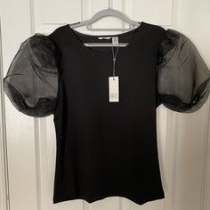 Pretty Blouse Great For Holiday Parties, With Sheer Sleeves, Nwt. Approx 21” Pit To Pit, 26” Long. Black Top With Sheer Puff Sleeves, Fitted Tops With Mesh Puff Sleeves, Fitted Top With Sheer Puff Sleeves, Party Tops With Mesh Short Sleeves, Black Puff Sleeve Top For Summer, Black Fitted Puff Sleeve Top For Spring, Fitted Black Puff Sleeve Top For Spring, Black Fitted Top With Balloon Sleeves, Black Fitted Balloon Sleeve Top