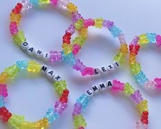 Personalized Gummy / Teddy Bear Bracelet Made using Clear Multi-Color Bear Beads & Double Strung elastic cord. You will receive (1) Bracelet Personalized Kawaii Multicolor Jewelry, Kawaii Multicolor Personalized Jewelry, Playful Handmade Jewelry For Party Favors, Playful Handmade Jewelry For Parties, Cute Customizable Multicolor Craft Supplies, Trendy Plastic Friendship Bracelets As Gift, Sweet Handmade Beaded Bracelets For Birthday, Pink Plastic Craft Supplies For Gifts, Personalized Rainbow Beaded Bracelets Cute Style