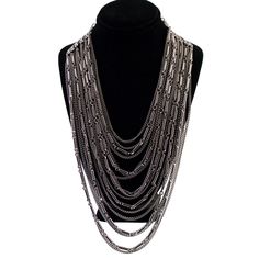 A vintage layered chain silver tone necklace. This is a fun piece that looks great on. It has a hook clasp and can be worn at adjustable lengths. The shortest chain is 15.75 inches long. In good condition. Silver Chain Link Layered Necklace, Silver Clavicle Chain Necklace For Layering, Silver Box Chain Necklace For Party, Silver Layered Necklace With Adjustable Chain For Party, Double Strand Metal Necklace With Silver Chain, Double Strand Silver Chain Necklace, Silver Double Strand Metal Necklace, Double Strand Necklace With Silver Chain, Silver Double Chain Link Necklace