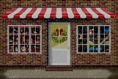 a red and white awning over a store front with christmas decorations on the windows