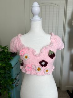 Strawberry Daisy Top🍓🌸  💖original design💖 crocheted by me<3 sizing and characteristics: - size ranges from small to medium - lettuce-trim ruffles - puffy sleeved - adjustable ribbon crossed in back of shirt - flower and strawberry designs attached to front - hand wash and lay flat to dry - shipping cost included in price Aesthetic Female, Daisy Top, Tempe Az, Female Clothing, Front Hand, Cropped Tube Top, Flower Shirt, Lettuce, Lay Flat