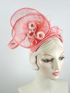 This women's peach/coral fascinator hat is a sure bet for Kentucky Derby or Kentucky Oaks. Or any summer event really, like church, ladies tea, or just for fun. It is made with sinamay straw and is very light and airy. The hand sculpted sinamay sits atop a handmade bandeau base and is secured with an elastic band that goes behind the ears and head to keep the hat in place. It is topped with vintage daisies and hand rolled sinamay leaves as well as sinamay swirls for added texture. An inner grosg Spring Party Headpieces In Sinamay, Spring Party Sinamay Headpiece, Whimsical Pink Summer Hat, Sinamay Fascinator Hat For Spring, Spring Sinamay Fascinator Hat, Summer Sinamay Headpiece For Races, Spring Sinamay Fascinator, Summer Party Headpiece In Sinamay, Summer Party Sinamay Headpieces