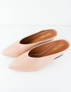 Our CAPE mule are a slick easy slip on! It has a small thick heel, is made of our soft vegan leather and has very comfortable patting inside for the most luxurious comfort. Comes in nude and white. Runs true to size. If you are a larger foot, take a size up. Heel height: 2" IMPORTED. Facebook Style, Thick Heel, Thick Heels, Christmas List, Mule, Vegan Leather, Take A, Cape, Heel Height