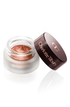 What it is: A clever cream-to-sheen eyeshadow that creates maximum impact with minimum effort.What it does: Soft-focus, illuminating pigments smooth over the delicate eye area, blurring lines and imperfections for a visibly more youthful finish.How to use: For a flattering look, simply use your fingertip to add a sheer wash of color across the eyelid. For a more dramatic effect, use a damp or dry brush and apply across the eyelid and lower lashline for high-impact, high-shine color. Style Name:C Eyes To Mesmerise, Oyster Pearl, Dry Brush, Cream Eyeshadow, Soft Focus, Dry Brushing, Eye Area, Charlotte Tilbury, Color Style