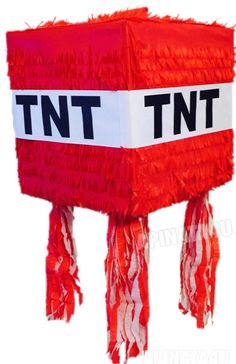 a red and white box with tassels hanging from it's sides that says tnt