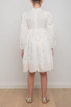 This dress features beautiful and delicate rose embroidery in an all-over scattered design with lavish hem embroidery. The sleeves are bracelet length and finished with an elastic cuff. The neck is high and the bust is fitted. The dress features a centre back zip for easy wear. 55% Linen 45% Cotton Cold wash Hem Embroidery, Embroidered Linen Dress, Blossom Embroidery, Embroidered Rose, Scallop Hem, Embroidered Linen, Rose Embroidery, Petite Dresses, Dress Pink