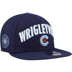 the wrigleywood hat is shown in blue and has white lettering on it