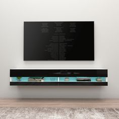 a large flat screen tv mounted to the side of a wall