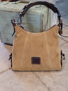 "Vintage Dooney and Bourke caramel suede and brown leather full zipper shoulder bag. Some wear, see photos. 13\" across 9.5\" length" Vintage Dooney And Bourke, Claw Earrings, Vintage Shoulder Bag, Feather Pendant, Dooney And Bourke, Dooney & Bourke, Shoes Women, Flat Shoes, Flat Shoes Women