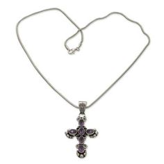 A sterling pendant consisting of six amethyst stones branches out in four directions forming a lovely cross. From Wayan Asmana the necklace melds the beautiful violet gemstone which represents February??s birthstone with silver to form an original design brimming with traditional Balinese sentiment. .925 Sterling silver Sterling Silver Spiritual Cross Pendant Necklace, Spiritual Sterling Silver Cross Pendant Necklace, Sterling Silver Spiritual Crucifix Necklace, Spiritual Sterling Silver Crucifix Necklace, Sterling Silver Crucifix Necklace In Spiritual Style, Sterling Silver Crucifix Necklace, Spiritual Cross-shaped Gemstone Necklace, Spiritual Cross Shaped Gemstone Necklace, Spiritual Sterling Silver Cross Necklace