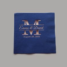 a blue napkin with the initials and date printed on it