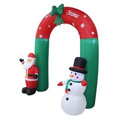 an inflatable christmas arch with a snowman and santa clause standing next to it