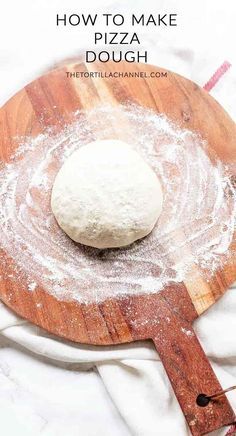 homemade pizza dough on a wooden cutting board with the words how to make pizza dough