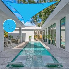 an indoor swimming pool in the middle of a house