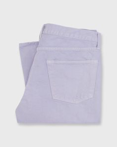 A quintessential pair of blue jeans, only garment-dyed to a surprisingly wearable shade of lavender. Trust us on the color and just lean into it — it looks especially great with browns and heather greys. Just like all of our Slim Straights, the shape riffs on two other longtime favorites: think Levi's 501s with more taper, APC New Standards with more room in the rise, and slimmer than both from the knee down. They're made in Los Angeles with ring-ring Cone Mills denim, blue oxford pocketing, a zip fly, brass rivets, chain-stitched hems, and clean, unbranded back pockets.