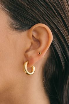 Keep it timeless and classic with this chunky hoop earring. The statement hoop is a time-honored piece that can be worn simply by itself as a chic earpiece, or layered with our other sizes as well as pendant earrings for a free and eclectic look. The chunky hoop is hollow and lightweight for added comfort when wearing. ✦ Small measures 15 mm round / 14K GP Brass ✦ Medium measures 20 mm round / 14K GP Brass ✦ Large measures 25 mm round / 14K GP BrassHandmade in Bali Chunky Hoop Earrings, Special Jewelry, Cheap Jewelry, Cleaning Jewelry, Pendant Earrings, Chain Pendants, Jewelry Plate, Base Metal, Precious Metals