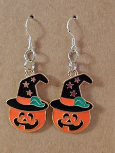 Handmade earrings for a spooky holiday mood! So cute for yourself or your little wizard or witch! Halloween Themed Jewelry For Costume Party, Themed Jewelry For Halloween Costume Party, Whimsical Halloween Dangle Jewelry, Fun Black Halloween Jewelry, Fun Black Jewelry For Halloween, Fun Orange Jewelry For Halloween, Handmade Jewelry For Halloween Costume Party, Handmade Costume Jewelry For Halloween, Fun Orange Halloween Jewelry