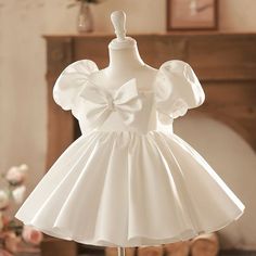 Balloon Sleeve Shiny Satin Puffy Skirt Baby Girl Baby Ceremony Dress with Bow Decoration  **Zipper closure **Etek 10 times embossed ** bow with pearl detail ** tulle top with robes  The color you want special to your order is produced by professional hands. chest circumference belly circumference and we work specially for you with your shoulder to knee dress length measurements. special occasion evening dresses baby sister sister combination suit ceremony dresses grandchild gifts baby girl gifts Fluffy Princess Dress, Crinoline Skirt, 1st Birthday Dresses, Satin Flower Girl Dress, Toddler Party Dress, Puffy Dresses, First Communion Dress, Infant Flower Girl Dress, Girls Formal Dresses