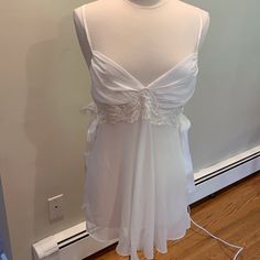 White Chiffon And Lace Night Gown With Satin Bows In Side And Matching Satin Bottoms. Never Worn. Excellent Condition. True To Size Large. Measurements: Side Seam To Side Seam: 15 Inches Shoulders To Hem: 31 Inches Coquette Night Dress, White V-neck Coquette Sleepwear, Sheer Camisole Wedding Sleepwear, White Sheer Nightgown, Sheer Camisole Sleepwear For Wedding, Sheer Camisole Nightgown For Wedding, White Camisole Sleepwear For Wedding, White Coquette V-neck Sleepwear, Sheer Camisole Nightgown For Wedding Night