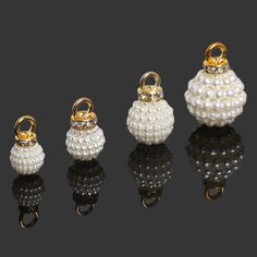 three different types of pearls and gold rings