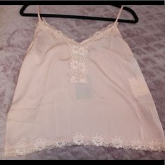 This Is A Brand New Lace Slip Blouse That Is A Pale Blush Pink. This Is Brand New And Has The Tags Still Connected. Price Is Negotiable! Chic Pink Blouse With Lace Trim, Feminine Spaghetti Strap Tops For Brunch, Chic Pink Camisole With Lace Trim, Pink Camisole For Spring Brunch, Pink Camisole For Brunch In Spring, Spring Pink Camisole For Day Out, Trendy Pink Tank Top For Brunch, Pink Spring Camisole For Day Out, Pink Sleeveless Top For Date Night