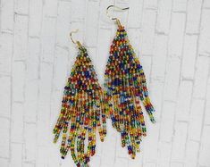 Seed Bead Fringe Earrings Long Red and Multicolored Metallic | Etsy Multicolor Beaded Fringe Earrings For Party, Multicolor Dangle Beaded Earrings With Gold Beads, Multicolor Fringe Beaded Earrings With Round Beads, Metallic Earrings, Seed Bead Fringe Earrings, Bead Fringe Earrings, Bead Fringe, Indian Earrings, Bead Work Jewelry