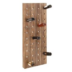 a wooden wine rack with several bottles on it