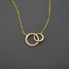 💖 Imagine the moment when you present her with this gorgeous interlocking circles necklace? A beautiful keepsake she can treasure forever.  💖 Beautiful and unique design with the two circles representing infinite love and a bond that can never broken  Why Choose Our Mother and Daughter Necklace?  ✨ Premium Quality & Superior Craftsmanship - 14K Gold and Sterling Silver ✨So pretty and absolutely gorgeous, she is sure to fall in love upon first glance. ✨ Unique and Beautiful Design ✨2 Interlocki Circle Rings, Couples Necklace, Interlocking Circle Necklace, Circles Necklace, Wife Necklace, Original Necklace, Rings Necklace, Couple Necklaces, Daughter Necklace