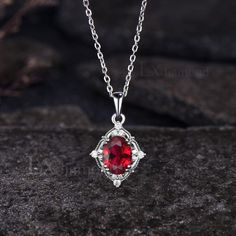 Item description ✦ Handmade, high-quality item! ✦ Material: 925 sterling silver, Solid 14K/18K GOLD (can be made in white/rose/yellow gold), Platinum ✦ Center Stone: 6x8mm Oval Cut Lab Ruby ✦ Side Stones: Round Cut Moissanites ✦ Chain length can be adjusted between 16 inches and 18 inches As it is handmade, it needs 2-4 weeks to finish and then be shipped by USPS or FedEx. Return policy: We offer 30 days return policy. For any reason, if you are not completely satisfied with your order, you may return it for a refund.  Buyer is responsible for the handcraft fee (15%-30% of the total price) and the return shipping cost. White Gold Oval Ruby Necklaces, Oval Ruby Necklaces In White Gold, Silver Necklace With Lab-created Ruby Gemstone, Oval Pendant Jewelry With Accent Stones For Gift, Oval Diamond Jewelry For Valentine's Day, Oval Diamond Necklace For Valentine's Day, Red Oval Cubic Zirconia Jewelry, Oval Birthstone Jewelry For Valentine's Day, Oval Moissanite Necklace For Anniversary