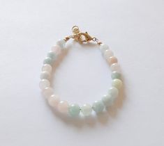 "If you would like to add gold filled hardware to a bracelet, please use this link to purchase it along with the bracelet. You will need to purchase one for EACH bracelet you would like to add gold filled hardware to. https://www.etsy.com/LittleLovliesShop/listing/860546443/gold-filled-upgrade?utm_source=Copy&utm_medium=ListingManager&utm_campaign=Share&utm_term=so.lmsm&share_time=1598757365437 Pretty Bubble bracelet. This bracelet is created with multicolored Morganite gemstone Handmade Pastel Bracelets For Gift, Cute Adjustable Pastel Jewelry, Adjustable Hypoallergenic Bracelet For First Birthday, Dainty Handmade Bracelets For Birthday, Cute Pastel Jewelry With Round Beads, Pastel Dainty Jewelry For Gift, Dainty Pastel Jewelry For Gift, Dainty Pastel Jewelry As Gift, Cute Pastel Round Bead Jewelry