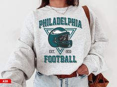 Welcome to my store ♥️ This Philadelphia Eagle, Vintage Philadelphia Eagle Football Crewneck Sweatshirt \ T-Shirt, Philadelphia Eagle, Philly eagle, Vintage Eagle Shirt, Eagle Gift, Eagle Crewneck, Eagle Apparel, Sunday Football, Game Day Shirt, Football Lovers, Gift for her, Gift for him, American Football, Super Bowl Shirt. *Please check Color and Size Charts before placing the order. You can find them in the listing's photos (Depending on what device you are viewing this listing colors may va Vintage Philadelphia Eagles Sweatshirt, Football Super Bowl, Bills Shirts, Sunday Football, New York Football, Tennessee Football, Buffalo Bill, Football Sweatshirt, Teenage Fashion