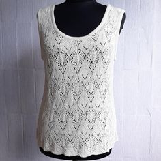 This beautiful women's white tank top is knitted from high-quality yarn (viscose). It is very soft, pleasant and comfortable. Knitted with very beautiful openwork patterns The product is made in one copy, in one size (size M). Please pay attention to the measurements: Product length - 60 cm / 23.6 inch circumference - 95 cm / 37.4 inch Completely handmade in its idea and design. Light and soft, it will perfectly complement your wardrobe, ideal for creating a wide variety of looks. Will make your White Tank Top Women, White Tank, White Tank Top, Handmade Knitting, Tank Top Fashion, Tank Tops Women, Womens Clothing Tops, Tank Tops, Yarn