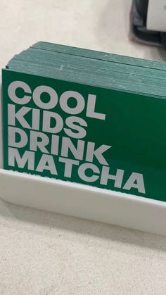 a green box with the words cool kids drink matcha on it