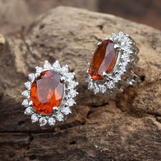 This Sterling Silver Earring features an Elegant Art With Natural Hessonite Gemstone. The cavity is made from genuine 18k Gold filled over solid 925 sterling silver and stamped as S925. This Jewelry is Lead free. ITEM DESCRIPTION Item Code: JACBS1/45 Metal: 925/92.5 Sterling Silver Gemstone: Genuine Natural Hessonite Gemstone Shape: Oval Faceted Gemstone Size: 6 X 8 MM Earring Length: 12 MM Earring width: 11 MM Surrounded Stones: Zircon Weight: 3.41 gm Finish: Gold/ Rose Gold/ Sterling Silver Ou Elegant Orange Earrings For Anniversary, Orange Earrings For Anniversary In Fine Jewelry Style, Elegant Orange Sterling Silver Earrings, Smokey Topaz Ring, Rings Vintage Boho, Hessonite Garnet, Dainty Studs, Blue Topaz Earrings, Tiny Earrings