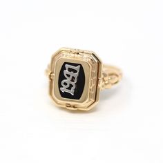 Rare vintage dated 1941 late Art Deco / Retro era 10k yellow gold onyx & cameo flip ring! This incredible vintage ring is unique in that it is double sided, and can be flipped from one side to the other. One side of the ring face depicts a woman's face in a carved shell cameo, and the other side is black onyx with the date "1941". The shoulders of the ring have pretty decorative designs. An exceptional piece of dated jewelry, that is two rings in one! *Sale - price reduced from $795 USD to $785 Flip Ring, Late Art, The Ring Face, Fall Rings, Retro Era, Deco Retro, Cameo Ring, Carved Shell, Heart Shaped Diamond