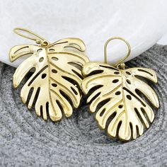 Monstera leaf earrings handmade brass waterproof hook dangles for women Gold Leaf-shaped Nickel-free Earrings, Gold Nature-inspired Metal Earrings, Gold Leaf-shaped Single Earring, Gold Single Leaf-shaped Earring, Metal Fish Hook Earrings, Handmade Leaf-shaped Earrings, Trendy Leaf-shaped Jewelry Gift, Nature-inspired Leaf-shaped Earrings, Gold Leaf Shaped Metal Jewelry