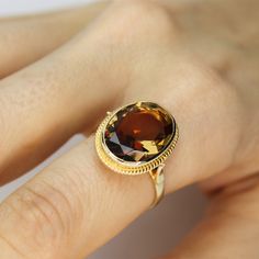 Color Changing Oval Zultanite Ring 14k Solid Gold Real Sultanite Ring Wedding Band Vintage Style Jewelry Christmas Gift For Women Anniversary ▶ 𝙋𝙍𝙊𝘿𝙐𝘾𝙏 𝙁𝙀𝘼𝙏𝙐𝙍𝙀𝙎 * 14k Solid Gold Ring * Zultanite Gemstone Ring Width: 1.50 cm ( 0.59 inches) * Zultanite Gemstone Ring Lenght: 1.80 cm ( 0.70 inches) * Zultanite Gemstone Ring Height: 6.40 mm ( 0.25 inches) - Our Zultanite ring is real and natural stone. You can tell from the color change that it is original. It is not lab made. Zultanit Oval Citrine Birthstone Ring For Wedding, 14k Gold Oval Topaz Wedding Ring, Gold Topaz Oval Cabochon Ring As Gift, Gold Oval Cabochon Topaz Ring, Gold Oval Cabochon Topaz Ring Gift, Oval Gold Topaz Gemstone Ring, Gold Oval Topaz Ring For Anniversary, Luxury Oval Solitaire Topaz Ring, 14k Gold Oval Topaz Ring