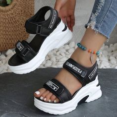 Brand New Trendy Black Open Toe Wedge Sandals, Black Open Toe Wedge Sandals With Heel Strap, Black Sport Sandals With Flat Heel For Spring, Black Flat Heel Sport Sandals For Spring, Trendy Black Wedge Sandals With Heel Strap, Black Synthetic Flat Heel Sport Sandals, Black Flat Heel Synthetic Sport Sandals, Black Round Toe Sport Sandals For Spring, Black Flat Heel Sport Sandals For Summer