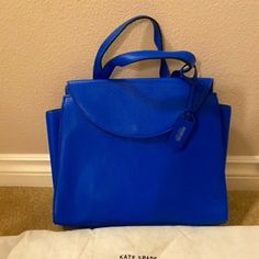 Never Used Cobalt Blue Kate Spade Saturday Purse. Designer Blue Bag With Double Handle, Luxury Blue Handheld Satchel, Designer Blue Handheld Satchel, Blue Handheld Office Bag, Classic Blue Satchel For Shopping, Classic Blue Bag For Shopping, Blue Top Handle Bag For Office, Designer Blue Satchel Tote, Modern Blue Top Handle Bag