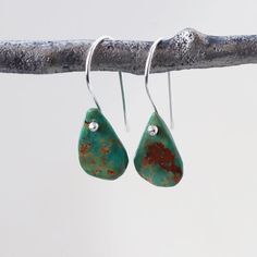 Raw natural Turquoise drops in an organic teardrop shape hang integrated onto sterling silver hook ear wires. The turquoise is full of matrix and character, and each stone is unique, making for a pair of similar but not identical gemstones — I match each pair of stones to be complimentary. The second photo shows a sample of the natural color and veining variation in each stone. The total length of the earrings is just over is approximately 1.2 inches from the curve of the earwire to the bottom o Turquoise Drop Earrings, Real Turquoise, Necklace Chain Lengths, Southwestern Style, Genuine Turquoise, Turquoise Pendant, Natural Turquoise, Sterling Silver Bands, Gorgeous Earrings