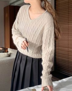 Casually elegant v neck in a soft grey mohair and wool blend. - V neck- Relaxed fit- Dropped sleeves - Delicate cable knit- Ribbed cuffs and hemline- Length 21", Bust 40", Shoulder 18", Sleeve 31"- Kid mohair 30%, Wool 30%, Nylon 40%- Dry clean- Imported Casually Elegant, Cable Knit, Wool Blend, Dry Clean, Cable, Relaxed Fit, V Neck, Wool, Knitting