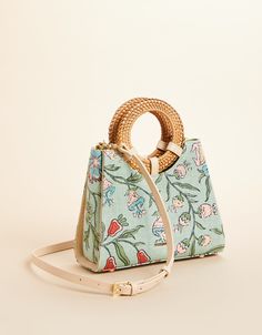 With round wicker handles, our Abby Crossbody is a petite, Lowcountry style that is ready to be carried through the Spring and Summer. Its hidden magnetic closure opens to a slip pocket and zipper pocket. Plus, the optional crossbody strap can make Abby hands-free in a snap! Lowcountry Style, Floral Block Print, Spartina 449, Ladies Clothing, Trendy Tshirts, Playing Dress Up, Crossbody Strap, Magnetic Closure, Hands Free