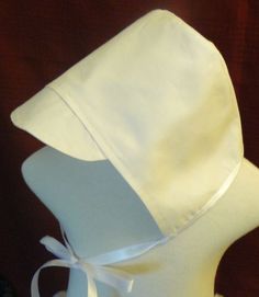 Darling christening hat, blessing hat, baptism hat, goes with any of our boy outfits. Hat is handmade to fit the measurements of your baby. Made of cotton twill with a ribbon bow under the chin. Please give me a measurement from the bottom of one ear over the top of the head to the bottom of the other ear with your order I usually ship first class within 1-3 business days for free. You can upgrade to priority at checkout. You can also upgrade to express if needed. Please let me know exactly when White Adjustable Bonnet For Wedding, White Adjustable Wedding Bonnet, White Adjustable Hat For Baptism, Adjustable Cream Bonnet For Baptism, Adjustable Cream Bonnet As A Gift, Adjustable Cream Bonnet As Gift, Classic White Hats For Church, Adjustable Bonnet For Church, Adjustable Cream Hat For Gifts