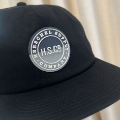 Brand New Perfect Condition Never Been Worn Classic Black Snapback Hat With Curved Brim, Trendy Black Dad Hat With Short Brim, Classic Black Snapback Hat With Logo Patch, Vintage Black Hat With Logo Patch, Vintage Black Dad Hat, Black Vintage Hat With Logo Patch, Black Vintage Dad Hat With Curved Brim, Casual Black 5-panel Snapback Hat, Casual Black 5-panel Dad Hat