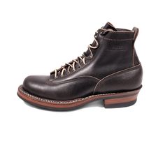 a pair of black boots with brown laces