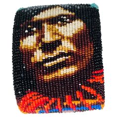 By famous Native American artist, Marcus Amerman, this bracelet is one-of-a-kind! The attention to detail and craftsmanship are unmatched. Glass beaded bracelet is a portrait of Scorched Lightning, (Assiiboine) Sioux Nation shows his face and famous bear claw necklace. Truly special! Inner suede of bracelet is signed by designer. Has had one owner, but has never been worn. Sioux Nation, Bear Claw Necklace, Native American Beadwork Patterns, Claw Necklace, Glass Beaded Bracelet, Bear Claw, Native American Crafts, Native Beadwork, Bear Claws