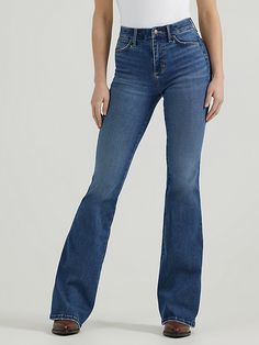 Turn up the volume and give those curves the love they deserve with our Women’s Wrangler® Bespoke High-Rise Flare Jean. We've made the vintage-inspired style even more flattering with a silhouette and angled back pockets to accentuate your shape. These new and improved bell-bottoms also come with a contoured waistband that eliminates gapping. Plus, the signature “W” pocket stitching and logo patch for an extra dose of authenticity. Our new Wrangler Bespoke Collection features superior stretch an Wrangler Jeans Women's, Pocket Stitching, Turn Up The Volume, Jean Pants, Wrangler Jeans, New And Improved, Turn Up, Western Outfits, Women's Jeans