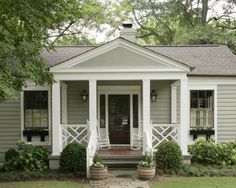 an image of a small house with porches