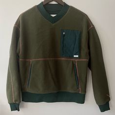 Never Worn, Brand New Fleece Sweatshirt From Saturdays. Surf Skate Wear Label Similar To Almond, Mollusk, Corridor, Norse Projects, Faherty, Pilgrim, Patagonia, Etc. Army Green With Teal Patchwork Pocket And Contrasting Orange Thread Detailing. Outdoor Crew Neck Top With Kangaroo Pocket, Sporty Fleece Sweater With Pockets, Casual Long Sleeve Tops With Fleece Lining, Green Fleece Sweatshirt With Pockets, Winter Crew Neck Tops With Fleece Lining, Fleece Tops With Ribbed Cuffs For Outdoor, Outdoor Fleece Tops With Ribbed Cuffs, Green Crew Neck Sweatshirt With Kangaroo Pocket, Green Crew Neck Sweatshirt With Pockets