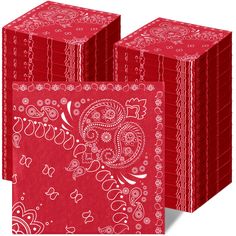 red paper napkins with paisley designs on them